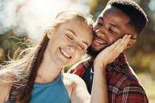 Park, Love And Interracial Young Couple Enjoying Weekend, Holiday And Summer Vacation Together. Bonding, Affection And Happy Black Man And White Woman Embrace, Hugging And Smiling Outdoors In Nature