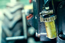 Chinese Fuel Filter On A Walk-behind Tractor Close-up On A Blurred Background