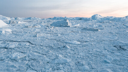 Wall Mural - climate change and global warming. icebergs from melting glacier in ilulissat, greenland. arctic nat