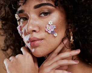 Wall Mural - beauty, flowers and makeup, portrait of black woman from brazil with beautiful face on studio backgr