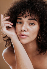 Wall Mural - skincare, hair care and face of woman with beauty, makeup and cosmetics against a brown studio backg