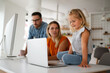 © NDABCREATIVITY - Working from home with child. Busy business parents working while kid playing on laptop.