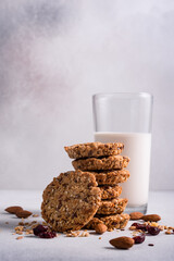 Wall Mural - Cereal biscuits or cookies with nuts and glass of milk for healthy and tasty snack