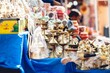 Closeup shot of golden Hindu decorations for sale in a local market in India