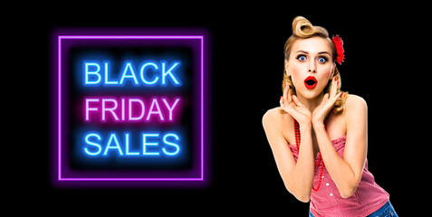 Wall Mural - Unbelievable deals! Excited surprised, very happy woman. Pin up syle girl with open mouth and raising hands. Retro and vintage studio ad concept. Black Friday sales neon light sign.