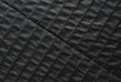 A sheet of black corrugated cardboard as background 