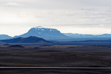 A Road Cuts Through Aa Alien Looking Barren Rocky Landscape, Iceland.