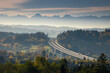 Highway towards the Tatra Mountains in autumn scenery with a view of the highest peaks in Poland.