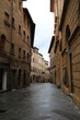 Old narrow alley in Volterra at Regen, Tuscany Italy