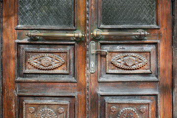 Wall Mural - aged doors with handles, closeup