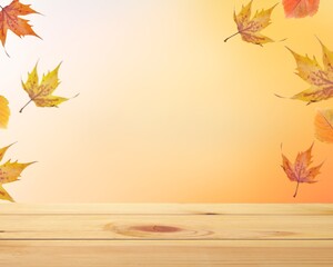 Wall Mural - Blank wooden table top with fall leaves.