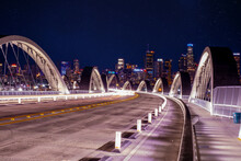 New 6th Street Bridge In Los Angeles At Night With The Los Angles Skyline Background, California.