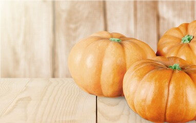 Poster - Fresh ripe pumpkins on wooden desk