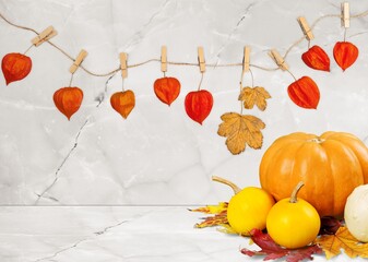 Canvas Print - Fresh ripe pumpkins and fall leaves on the desk