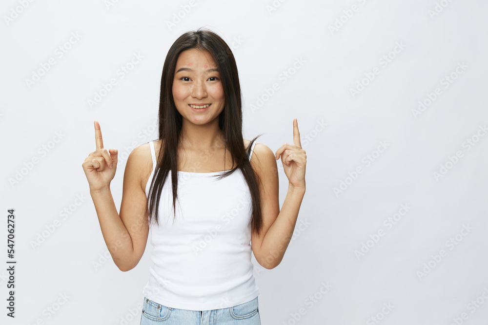 Asian woman hand signals, finger pointing facial skin problems, acne ...