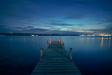 Landscape Photo Of A Jetty On Lake At Night In Varna, Bulgaria.