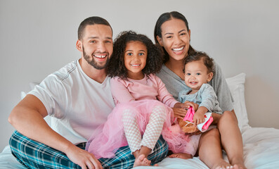 Canvas Print - Family, portrait and bedroom relax for bonding, love and care with girl children on the home bed. Mother, father and sisters or siblings bond with parents in loving relationship in childhood