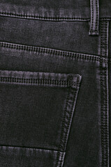 Sticker - Part of dark jeans.