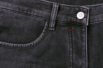 Sticker - Part of dark jeans.