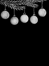 Drawing Fir Tree Branch And Christmas Gingerbread Cookies Like New Year Balls Hanging On Black Chalk Board Background. Merry Christmas And Happy New Year, Bw Border With Copy Space, Top View Vertical