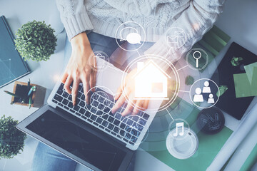Poster - Double exposure of woman hands working on computer and buildings construction hologram drawing. Top View. smart city concept.