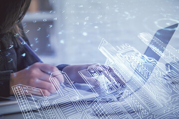 Poster - Double exposure of woman hands typing on computer and buildings drawing. Smart-city concept.