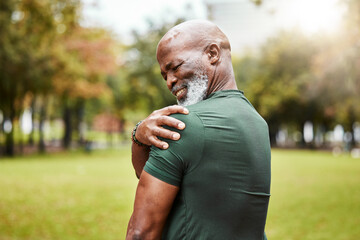 Wall Mural - Senior black man with shoulder pain, fitness injury and exercise in the park with muscle ache or inflammation outdoor. Health, accident during workout and hurt, elderly person with pain from sport.