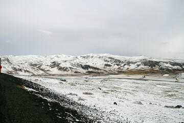 Wall Mural - Volcanic green snowy moss landscape in Iceland 3