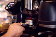 © Monkey Business - Close Up Of Barista In Cafe Using Machine To Make Coffee