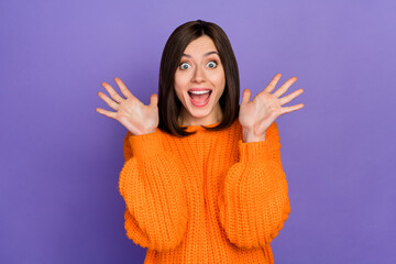 Wall Mural - photo portrait of gorgeous young woman raise arms excited scream dressed stylish knitted orange garm