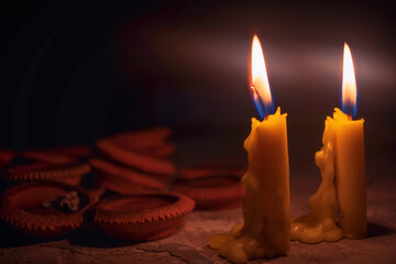 light up the night. Loy Krathong Festival. The glow of candlelight at night. Light the 2 candles to increase the brightness at night outside the house.