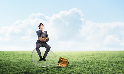 young businessman with a book