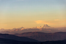 Landscape With The Peak Of Mount Kazbek On The Horizon In The Rays Of The Setting Sun