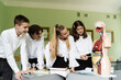 © Rabizo Anatolii - Pupils studying internal organs at the educational dummy manikin in classroom. Schoolchildren examining anatomical model in lab in school at biology lesson.
