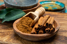 Indian Spices Collection, Dried Aromatic Cinnamon Barks And Another Spices In Clay Bowls
