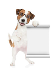 Poster - Smart jack russell terrier dog  wearing eyeglasses shows on empty list. isolated on white background
