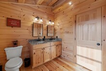 Bathroom Interior Of Log Cabin In Mountains