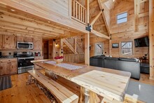 Kitchen Interior Of Log Cabin In Mountains