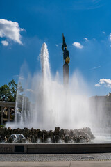 Poster - the fountain and statue of the Soviet War Memorial at Schwarzenbergplatz Square in Vienna