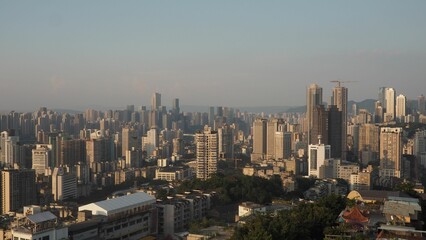 Sticker - Cityscape of urban skyscrapers and towers with blue sky on the horizon