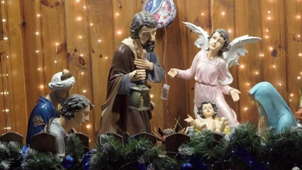 Wall Mural - Christmas nativity scene at night,Christmas of Jesus Christ, Christmas figurines on Christmas night in front of the church