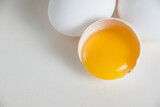 Eggs and egg yolk in shell isolate on white background