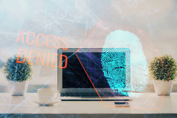 Poster - Computer on desktop in office with finger print drawing. Double exposure. Concept of business data security.
