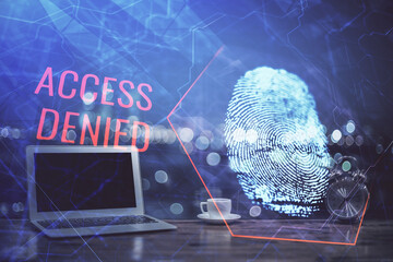 Poster - Computer on desktop in office with finger print drawing. Double exposure. Concept of business data security.