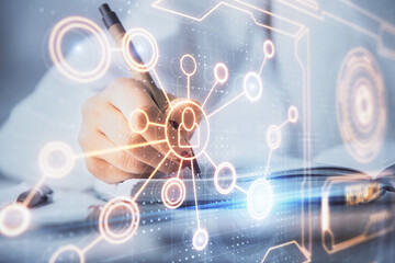 Poster - Social network theme hologram over hands taking notes background. Concept of global international people connect. Double exposure