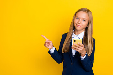 Wall Mural - Photo of pretty cute nice girl user arm direct demonstrate cool offer proposition shopping isolated on yellow color background