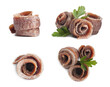 Set with delicious rolled anchovy fillets on white background
