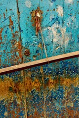 Weathered wooden door in blue