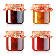 collection of fruits jam in small glass jars covered with paper isolated on white
