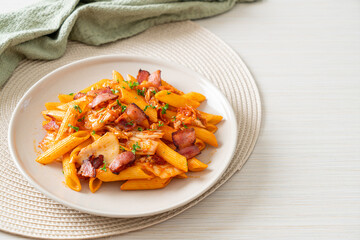 stir-fried penne pasta with kimchi and bacon